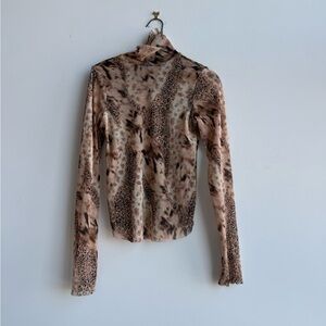 Callipygian Printed Mesh Turtleneck